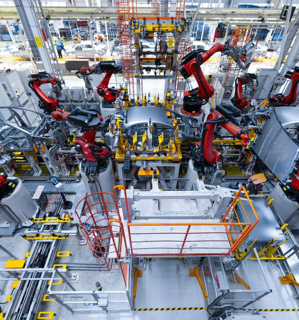 Large scale robotic automation line integrating welding material handling and assembly