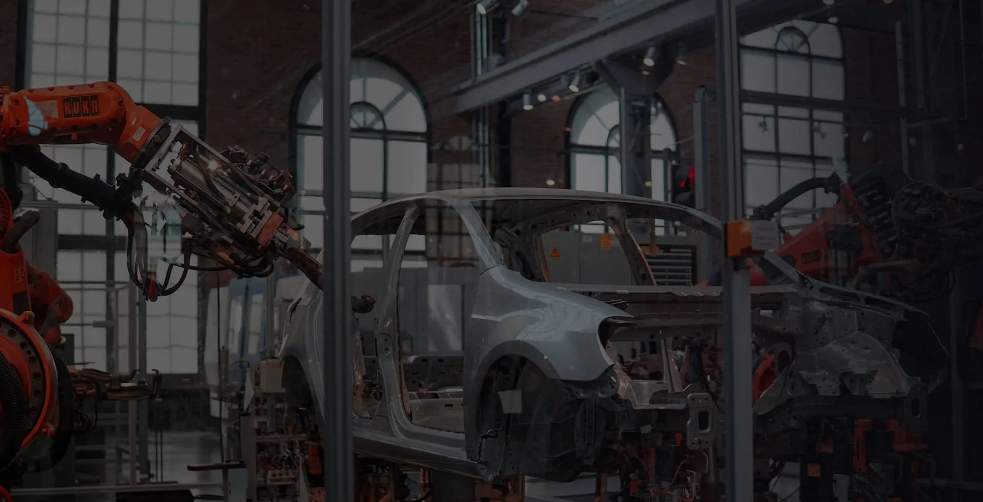 Robotic welding system for vehicle body manufacturing