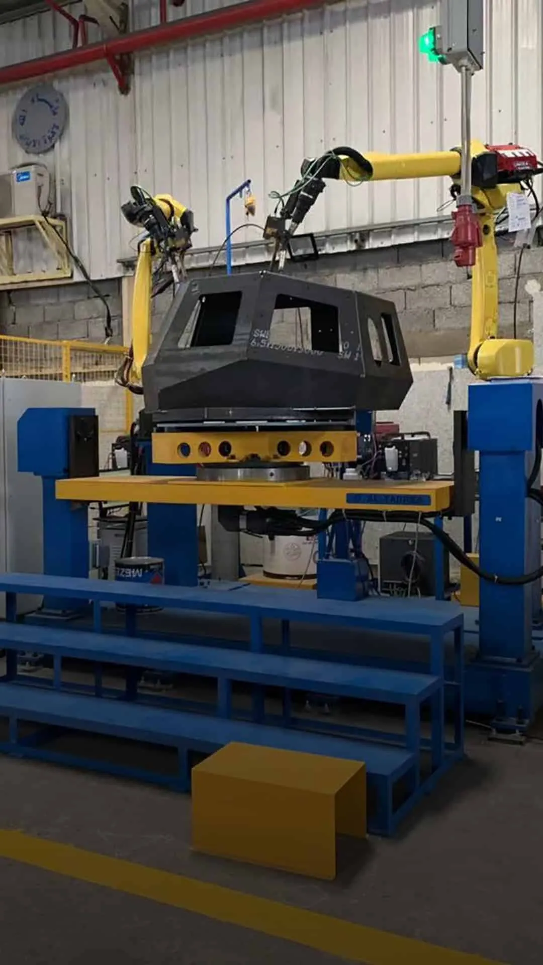 Robotic programming and control systems integrated into industrial automation workflows