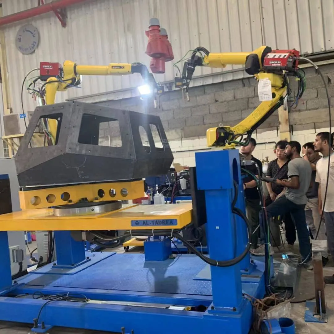 Robotic welding cell with positioner as part of an automated welding production line